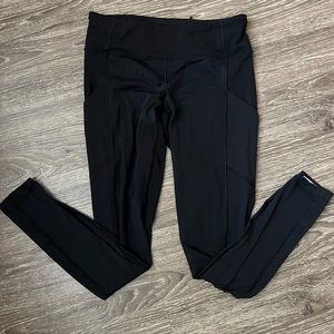 Lulu lemon black leggings with pockets and zipper on the back